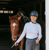Smiling lady and horse